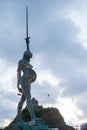 View of Damien Hirst's Verity at Ilfracombe harbor