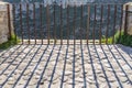 View of danger steel fence on valley with shadow in day light, M