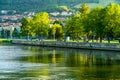 View of Danube river and Orsova city vegetation and buildings, waterfront view. Orsova, Romania, 2021