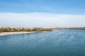 View of Danube river Petrovaradin fortress and city beach Strand of Novi Sad Serbia with blue sky above on sunny autumn day Royalty Free Stock Photo