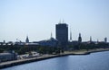 View of Daugava river embankment. View at the Old Town of Riga, church towers and modern skyscrapers Royalty Free Stock Photo