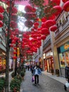 View of decorative lanterns hanging between buildings welcoming Chinese New Year on Lee Tung Avenue, Wan Chai, Hong Kong.