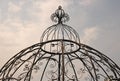 DECORATIVE METAL DOME AGAINST CLOUDY SKY Royalty Free Stock Photo