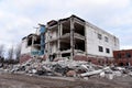 View of the demolition of a multi-storey building. Dismantling and demolition of buildings and structures. Destroy concrete Royalty Free Stock Photo