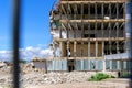 View of the demolition of a multi-storey building. Dismantling and demolition of buildings and structures. Destroy concrete Royalty Free Stock Photo