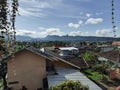 A view of dense housing with a mountainous background Royalty Free Stock Photo