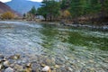 View of the densely packed dwellings on the banks of river Paro Chu in Thimphu, Bhutan. Paro is the second largest city In Bhutan