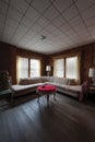 Derelict Living Room with Corner Couch + Table + Phone - Abandoned House - New York