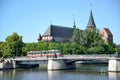 View of Derevyanny Bridge and the Konigsberg cathedral in sunny summer day. Kaliningrad