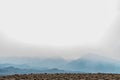 View of Eastern Sierra Nevada mountains shroud in smoke of California forest fire Royalty Free Stock Photo