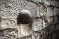 Detail of an old Holy Water font at a Maronite stone church in Lebanon