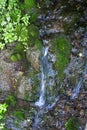 View of a detail of a small waterfall with little water Royalty Free Stock Photo