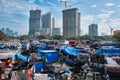 Dhobi Ghat is an open air laundromat lavoir in Mumbai, India with laundry drying on ropes