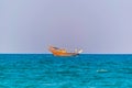 View of a dhow ship on an open sea in Oman Royalty Free Stock Photo