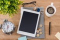 View of digital tablet near coins Royalty Free Stock Photo
