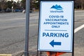 View of directional sign COVID-19 vaccination appointments only on a parking lot in Beban Park Royalty Free Stock Photo