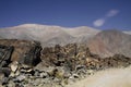 View from dirt road on dry barren mountain range in Atacama desert, Chile Royalty Free Stock Photo