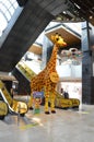 View from distance to giraffe made of lego cubes