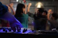 A view from DJ's deck of a crowd dancing in nightclub, Royalty Free Stock Photo