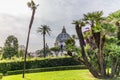 View of the dome of Saint Peter`s Basilica in Rome seen from a garden Royalty Free Stock Photo
