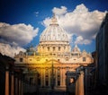 View of dome St. Peter`s and Vatican in Rome at sunset. The Vatican is the most prominent state in the world