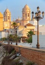 Cathedral of the Holy Cross on the Cadiz waterfront at dawn. Royalty Free Stock Photo