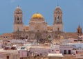 Cathedral of the Holy Cross on the Cadiz waterfront on a sunny day. Royalty Free Stock Photo