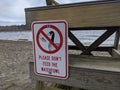 Don`t Feed Waterfowl sign on the back of a lifeguard stand at Juanita Beach Park Royalty Free Stock Photo