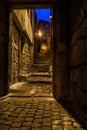 View from a door to a stairs in an old village stone town Royalty Free Stock Photo