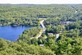 View from Dorset lookout tower towards highway, Lake of Bays, and forested landscape
