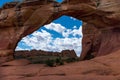 A view of Double Arch at Arches National Park, Utah, USA, bright blue sky, fluffy white clouds and no people Royalty Free Stock Photo