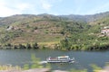 View of the Douro mountains and river with a tourism boat