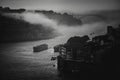 View of the Douro river in old city center in the fog, Porto, Portugal. . Royalty Free Stock Photo