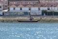 View of Douro river, with rabelo boat, transports the Porto, marginal of Gaia city as background Royalty Free Stock Photo
