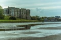 A view of the Carew estuary past Carew Castle towards the Tidal Mill in Pembrokeshire Royalty Free Stock Photo