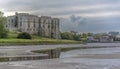 A view down the Carew estuary, past the ruins of Carew Castle towards the Tidal Mill in Pembrokeshire, UK Royalty Free Stock Photo