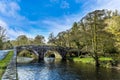 A view down the Cleddau river at Llawhaden, Wales towards eighteenth-century graded 2 listed bridge Royalty Free Stock Photo