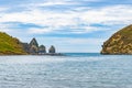 View down Cook`s Cove to sea and pinnacle shaped rocks