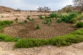 A view down the dried up Agab river bed at Oruhito in Namibia Royalty Free Stock Photo