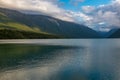 A view down the length of the incredibly beautiful Rotoiti Lake surrounded by mountains which is part of the Nelson Lakes National Royalty Free Stock Photo