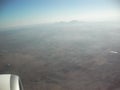 A glimpse from the window of an airplane in an ongoing flight journey