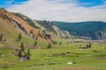 A view down a river valley, with the town of Altraga in the distance, Mongolia Royalty Free Stock Photo