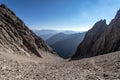 View down at the rocky descent from a mountain