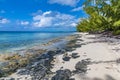A view down a rocky shoreline on a quiet beach on the island of Eleuthera, Bahamas