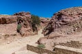 A view down a water channel beneath the Royal Tombs in the ancient city of Petra, Jordan Royalty Free Stock Photo