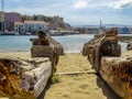 A view down a wooden boat slipway across Chania harbour, Crete on a bright sunny day Royalty Free Stock Photo
