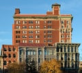view of downtown Binghamton buildings at sunset golden hour (historic architecture on court street and chenango)