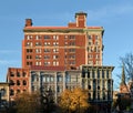 view of downtown Binghamton buildings at sunset golden hour (historic architecture on court street and chenango)