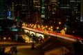 View of Downtown Calgary, Canada at night with colorful lights in the street and bridge Royalty Free Stock Photo