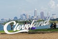View of downtown Cleveland and Cleveland script sign at Edgewater park